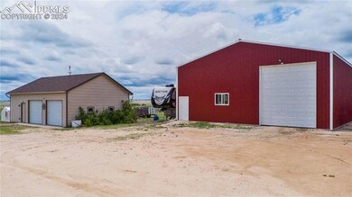 Pole barn with drive through doors, and detached g