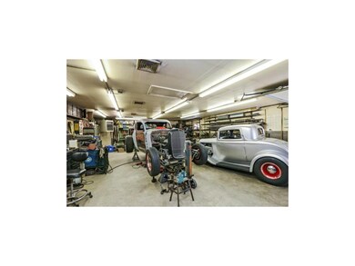 28x36 shop with separate heat. Access through the 