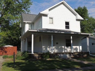 Put up a porch swing & enjoy the shaded front porch!
