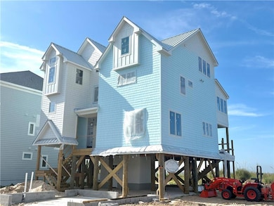 New construction home being built on neighboring lot