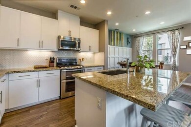 Pristine white cabinetry and recessed lighting bri