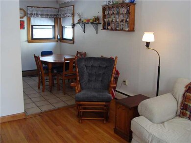 Living Room. View into Sunny eat in...