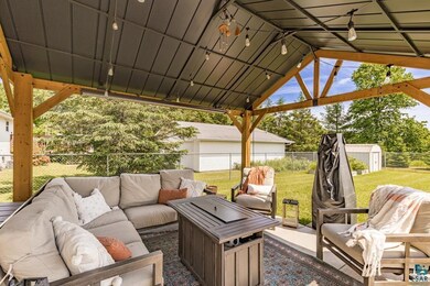 View of patio with an outdoor living space