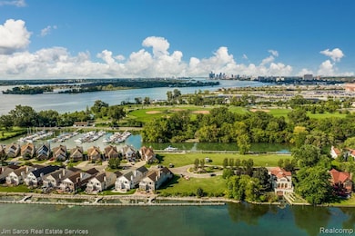 Aerial view of a marina and a large body of water