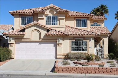 Mediterranean / spanish-style house with driveway,