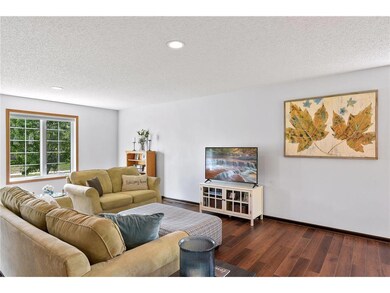The spacious family room is filled with natural li