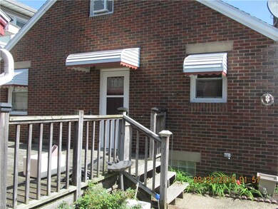 View in back with large back deck