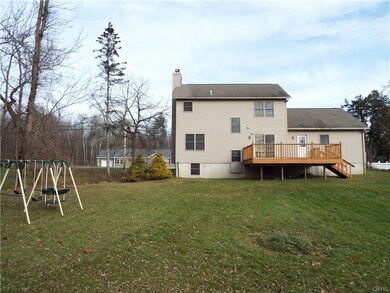 Rear of Home showing the Large Yard & Large Deck A