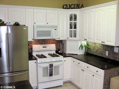 Kitchen - Granite Kitchen with Step-up Breakfast B