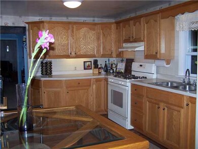 Kitchen Kitchen is located just off the Living Roo