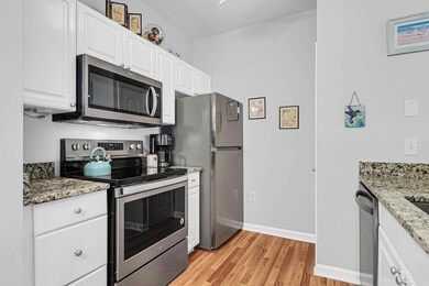 Kitchen with stainless and new fridge!