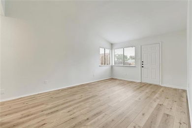 Empty room featuring light wood-type flooring, va