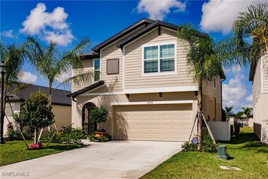 View of front of house featuring a garage and a fr