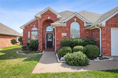 View of front of house featuring a front yard and 