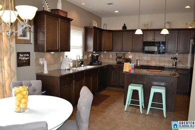 BEAUTIFUL CABINETRY, GRANITE COUNTERTOPS, UNDER-CA