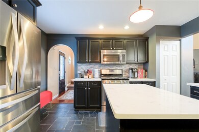 Stainless steel appliances and modern touches thro
