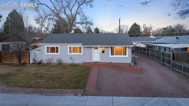 Ranch-style house at twilight featuring upgraded s