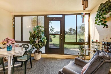 Downstairs Glass Enclosed Patio