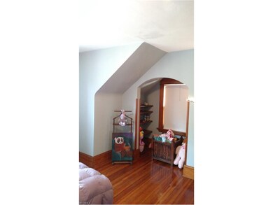 Master bedroom has a walk in closet as well as this cute, nook flanked by shelving.