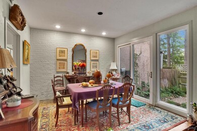 Dining room with hardwood / wood-style flooring an