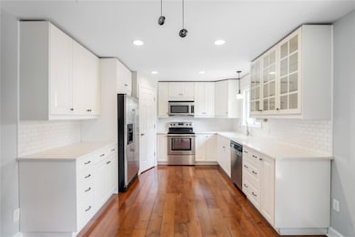 Kitchen featuring appliances with stainless steel