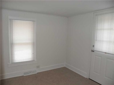 Den. Front Room could be 3rd Bedroom or Den off Li