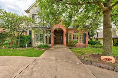 Tudor home with a front yard