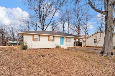 Ranch-style home with a carport