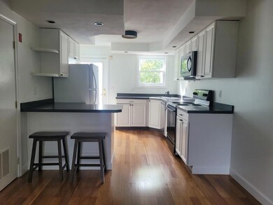 Great space to cook while enjoying the treed view