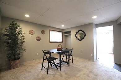 Large dining room also has recessed lighting and b