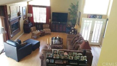 Large formal living room with vaulted ceiling, woo
