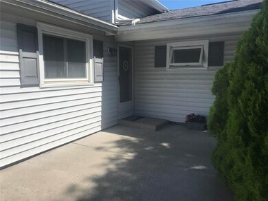 You can enjoy sitting on this front patio.