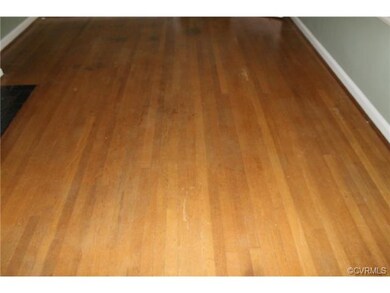 Hardwood floors in living room.