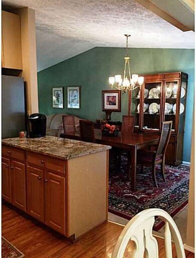 Other. This photo is taken from the morning room looking at the dining room (notice open kitchen wall)