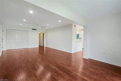Unfurnished living room featuring hardwood / wood-style floors, a ceiling fan, and recessed lighting