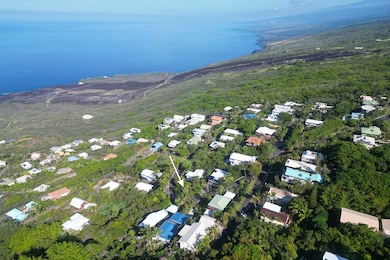 Aerial view of Kona Paradise Subdivision looking North toward Kealakekua Bay.
