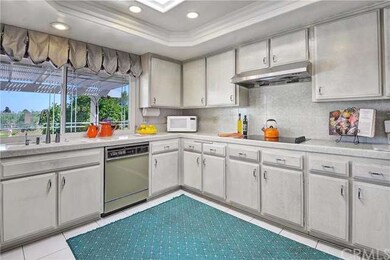 The kitchen is welcoming and looks out to the spar