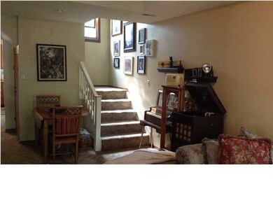 Stairs to large master bedroom and bath.