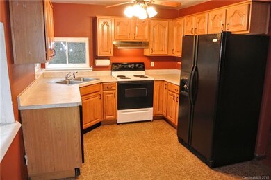 Kitchen has lots of cabinet storage
