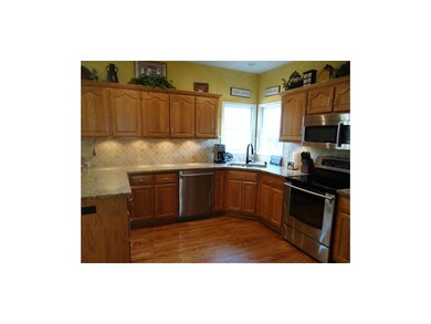 Granite Counter Tops, Tile Back Splash, Dual Sink 