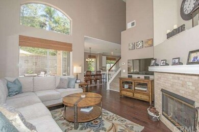 Stunning soaring ceilings and warm hardwood floori