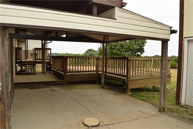 Deck and covered patio make a great spot to entert