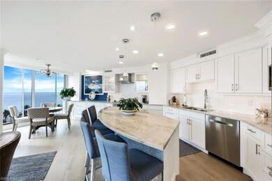 Kitchen with a water view, sink, stainless steel d