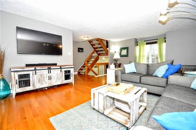 Family room with view of main entrance stairway.