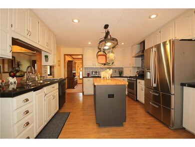 Recently updated island kitchen with enameled whit