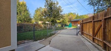 Gate featuring a patio area