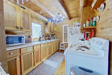 4553 S Paradise Rd, Merritt, MI 49667 - photo 3