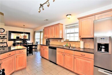 Kitchen has Ceramic Tile flooring, upgraded cabine