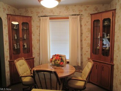 Spacious Eat-In Kitchen has built-in China Cabinets with storage underneath