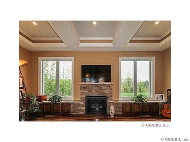 Exterior Front. Exquisite great room with windows 